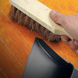 Zwarte metalen stofpan en borstel set voor efficiënt reinigen — thumbnail 1